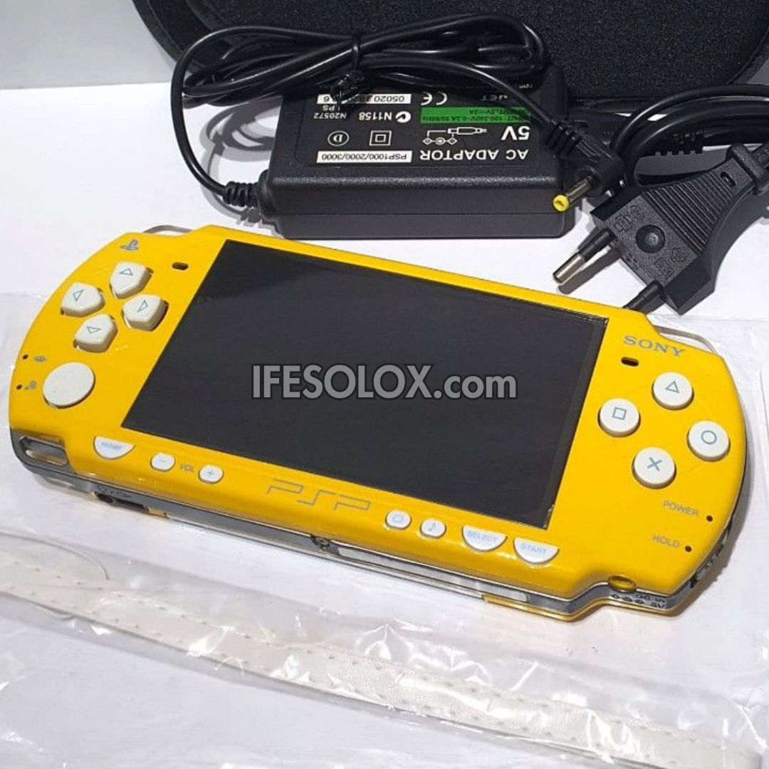 PlayStation Portable PSP 2000 series Game Console with 16GB Memory Stick and 15 Games (Yellow) - Foreign Used