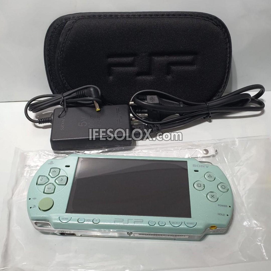 PlayStation Portable PSP 2000 series Slim Game Console with 16GB Memory Stick and 15 Games (Green) - Foreign Used