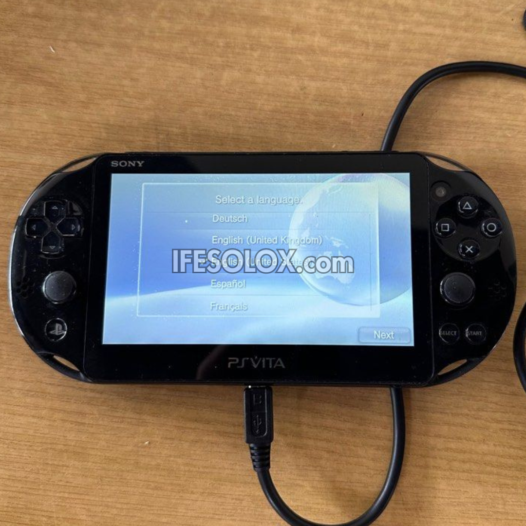 PlayStation VITA PCH-2000 Series Slim Game Console + 16GB Memory Stick and 15 Games (Black) - Foreign Used