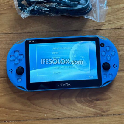 PlayStation VITA PCH-2000 Series Slim Game Console + 16GB Memory Stick and 15 Games (Blue) - Foreign Used