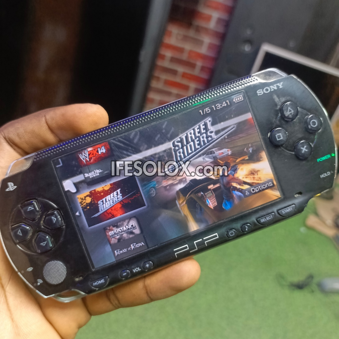 Sony PSP 1000 Video Game Console with 64GB Memory Stick and 100 Games (Custom Edition)