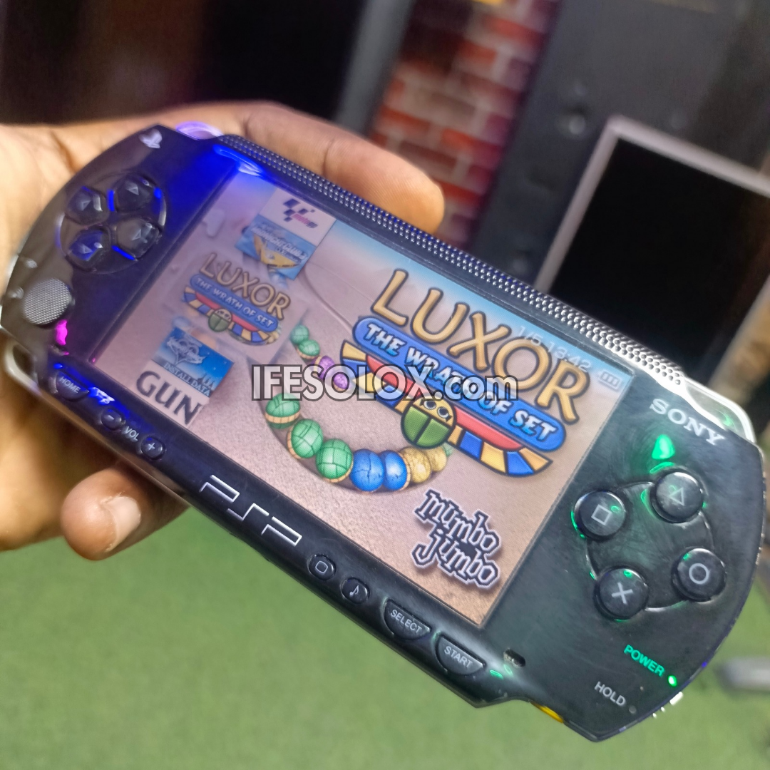 Sony PSP 1000 Video Game Console with 64GB Memory Stick and 100 Games (Custom Edition)