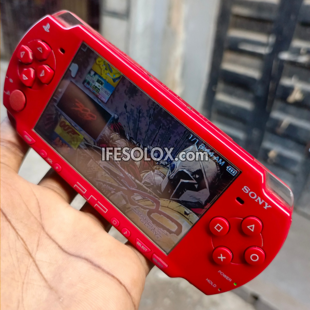 Sony PlayStation Portable PSP 2000 series Slim Game Console with 16GB Memory Stick and 15 Games (Red) - Foreign Used