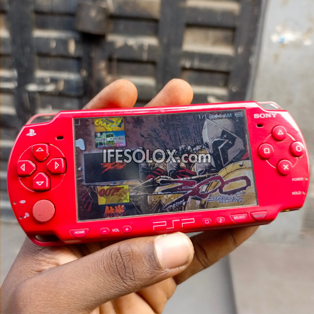 Sony PlayStation Portable PSP 2000 series Slim Game Console with 16GB Memory Stick and 15 Games (Red) - Foreign Used