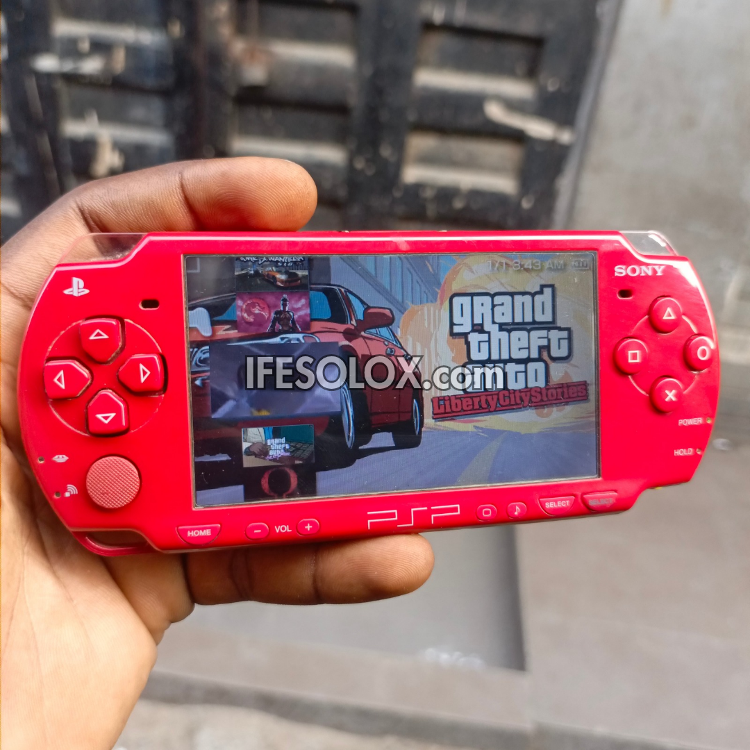Sony PlayStation Portable PSP 2000 series Slim Game Console with 16GB Memory Stick and 15 Games (Red) - Foreign Used