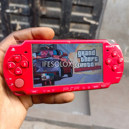 Sony PlayStation Portable PSP 2000 series Slim Game Console with 16GB Memory Stick and 15 Games (Red) - Foreign Used