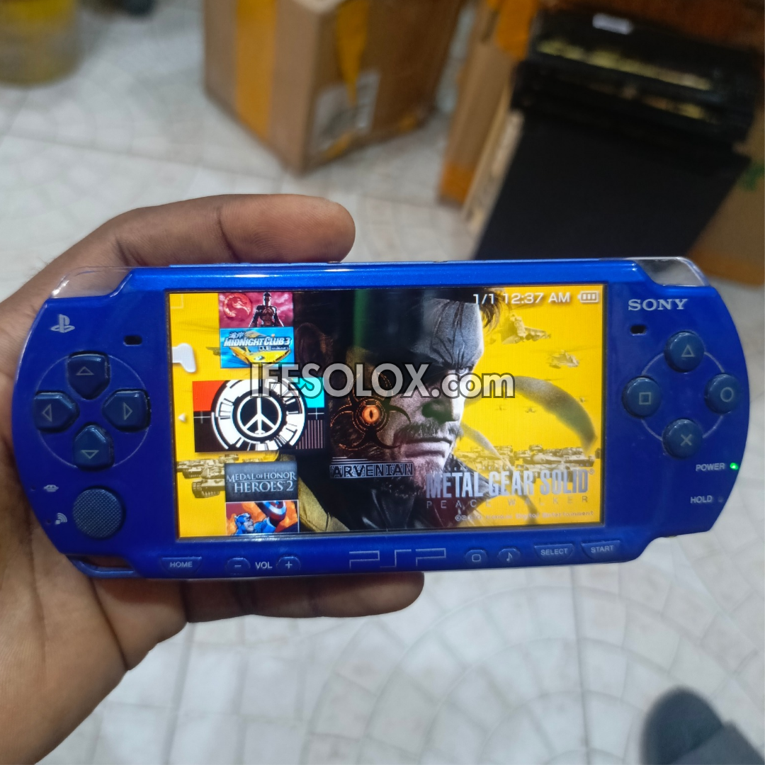 Sony PlayStation Portable PSP 2000 series Slim Game Console with 16GB Memory Stick and 15 Games (Blue) - Foreign Used