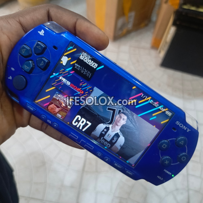 Sony PlayStation Portable PSP 2000 series Slim Game Console with 16GB Memory Stick and 15 Games (Blue) - Foreign Used