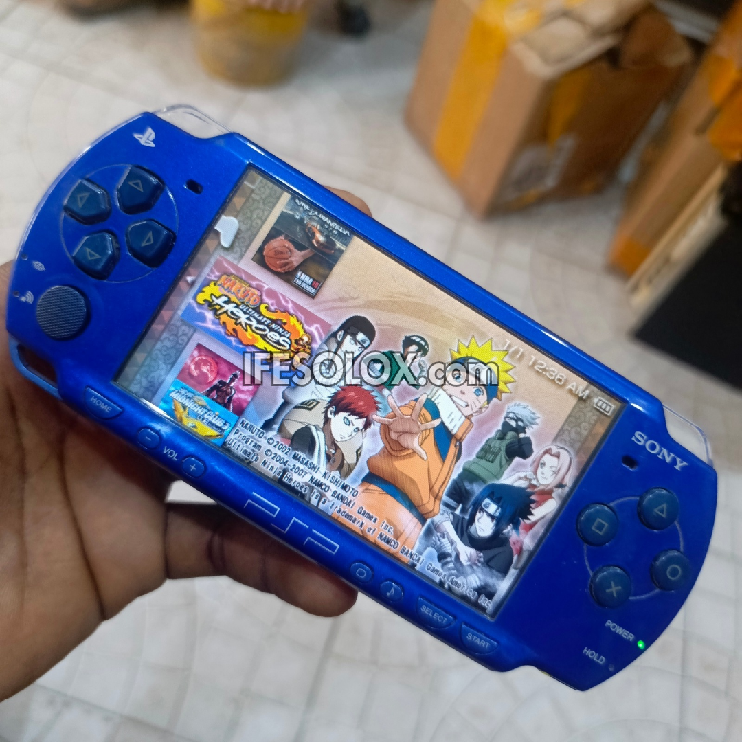 Sony PlayStation Portable PSP 2000 series Slim Game Console with 16GB Memory Stick and 15 Games (Blue) - Foreign Used