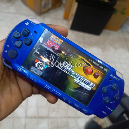 Sony PlayStation Portable PSP 2000 series Slim Game Console with 16GB Memory Stick and 15 Games (Blue) - Foreign Used