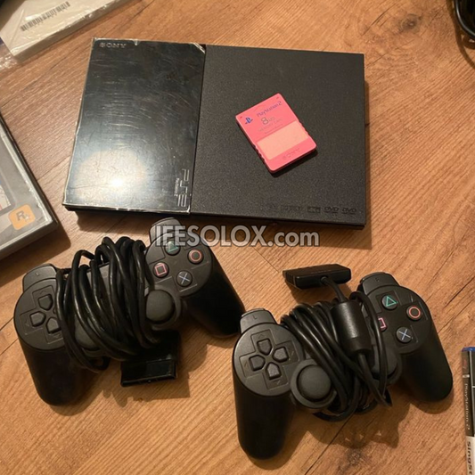 Sony Playstation 2 (PS2) Slim Game Console Complete Set with 2 DUALSHOCK Wired Controllers & 10 Titles - Foreign Used