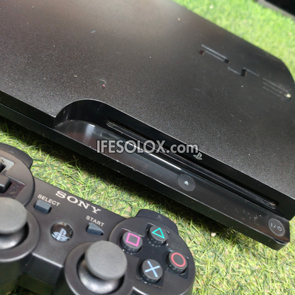 Console de jeu Sony Playstation 3 (PS3) Slim 120 Go avec 1 manette DUALSHOCK et 10 jeux - Occasion étrangère