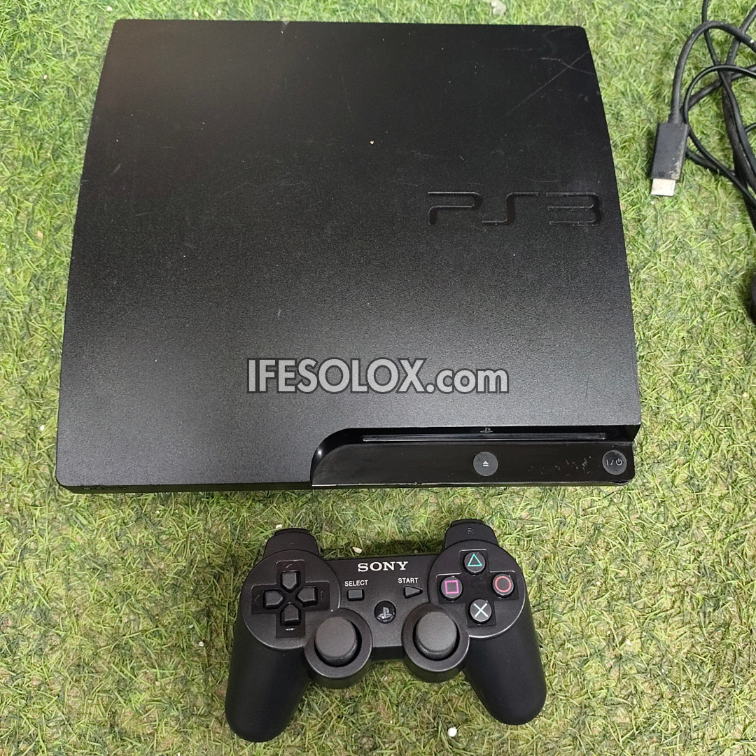 Console de jeu Sony Playstation 3 (PS3) Slim 120 Go avec 1 manette DUALSHOCK et 10 jeux - Occasion étrangère