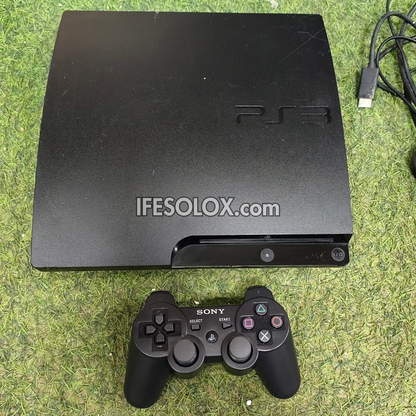 Console de jeu Sony Playstation 3 (PS3) Slim 120 Go avec 1 manette DUALSHOCK et 10 jeux - Occasion étrangère