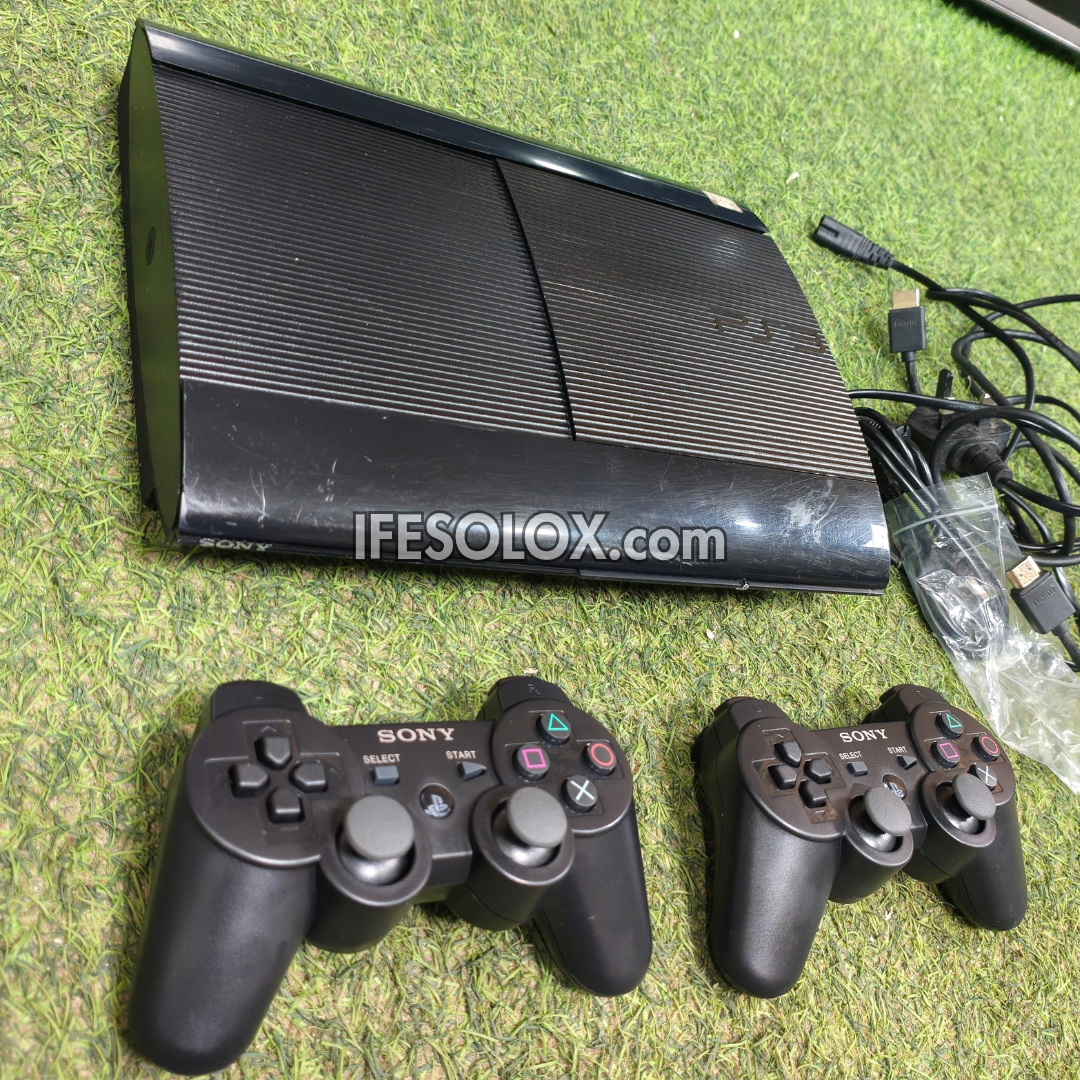 Sony Playstation 3 (PS3) Super Slim 250GB Game Console Complete Set with 2 DUALSHOCK Controllers and 15 Games - Foreign Used