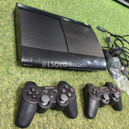 Sony Playstation 3 (PS3) Super Slim 250GB Game Console Complete Set with 2 DUALSHOCK Controllers and 15 Games - Foreign Used