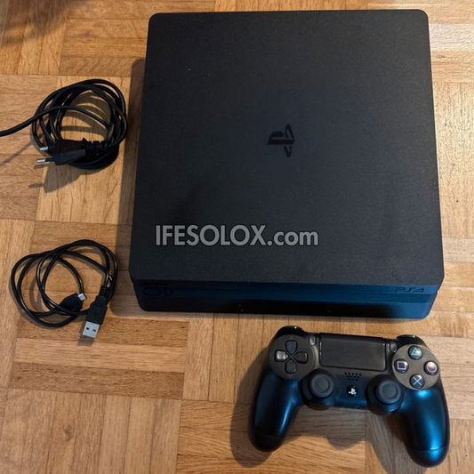 Sony Playstation 4 (PS4) Slim 1TB Game Console with 1 DUALSHOCK 4 Controller and 10 Titles - Foreign Used