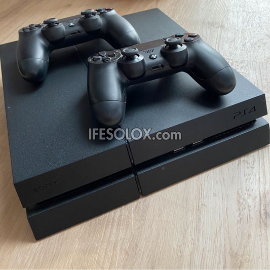 Sony Playstation 4 (PS4) 500GB Game Console with 2 DUALSHOCK 4 Controllers and 10 Titles - Foreign Used
