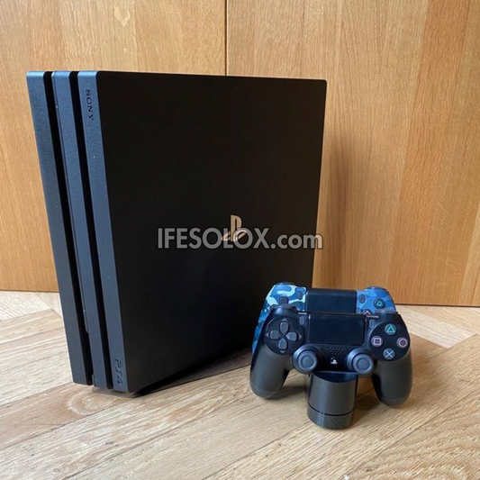 Sony Playstation 4 (PS4) Pro 1TB Game Console with 2 DUALSHOCK 3 Controllers with Charging Dock - Foreign Used