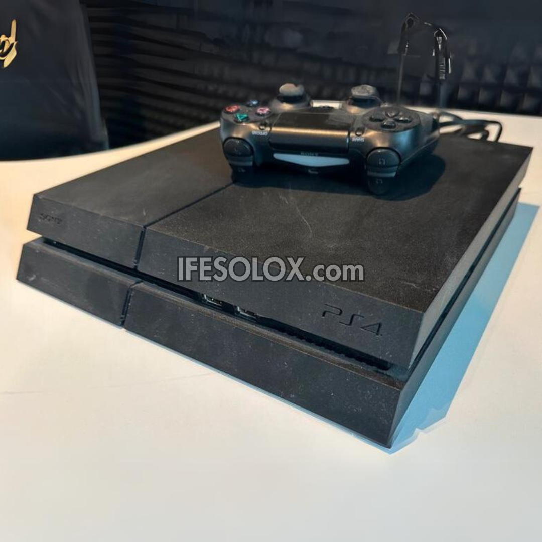 Sony Playstation 4 (PS4) 500GB Game Console with 1 DUALSHOCK 4 Controller and 10 Titles - Foreign Used