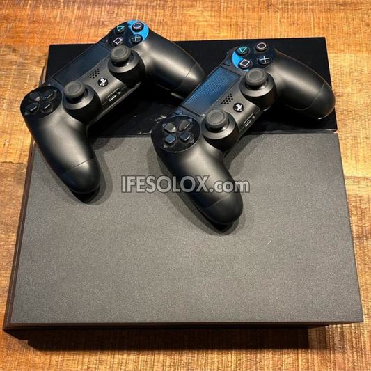 Sony Playstation 4 (PS4) 1TB Game Console with 2 DUALSHOCK 4 Controllers and 10 Titles - Foreign Used
