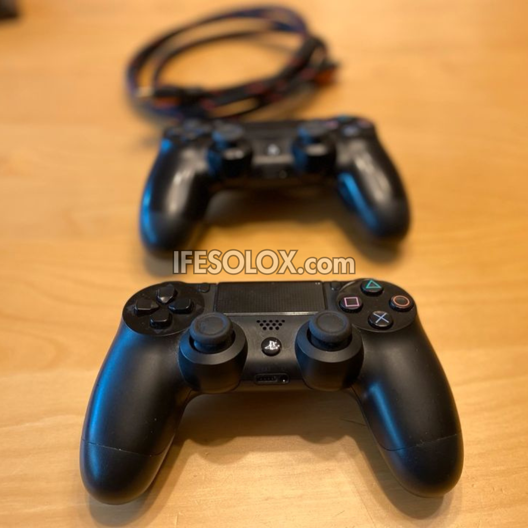Sony Playstation 4 (PS4) Slim 1TB Game Console with 2 DUALSHOCK 3 Controllers - Foreign Used