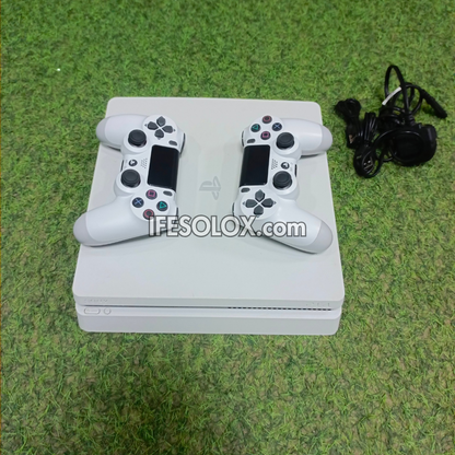 Sony Playstation 4 (PS4) Slim 500GB White Game Console with 2 DUALSHOCK 4 Controllers and 10 Games - Foreign Used
