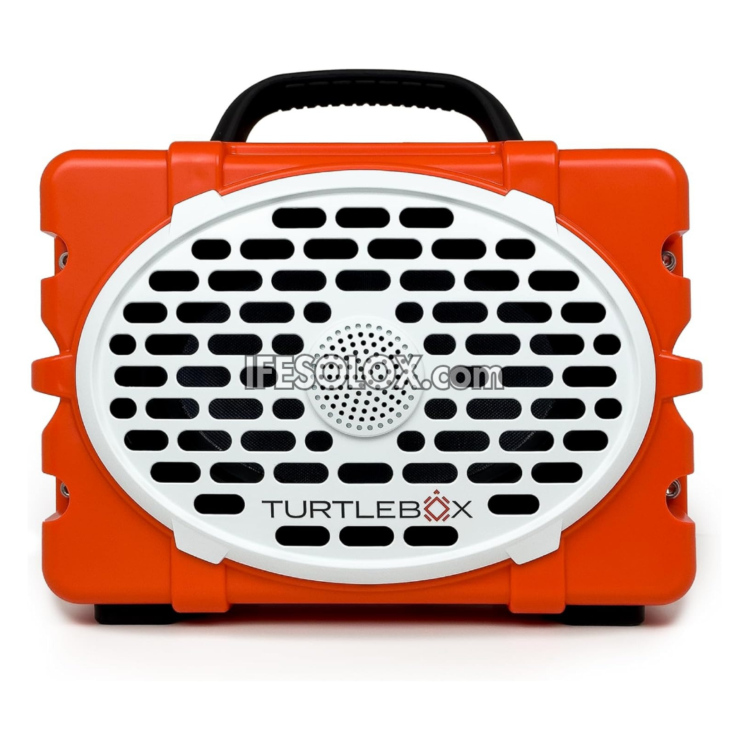 An orange and white TurtleBox portable speaker with a black carrying handle, shown against a plain white background.
