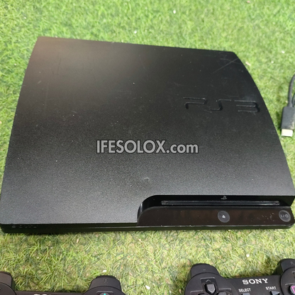 Sony Playstation 3 (PS3) Slim 120GB Game Console Complete Set with 2 DUALSHOCK Controllers and 10 Games - Foreign Used